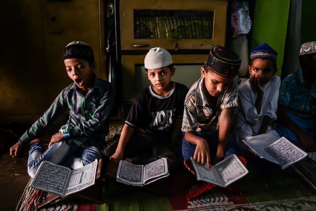 Children reading the quran in a mosque